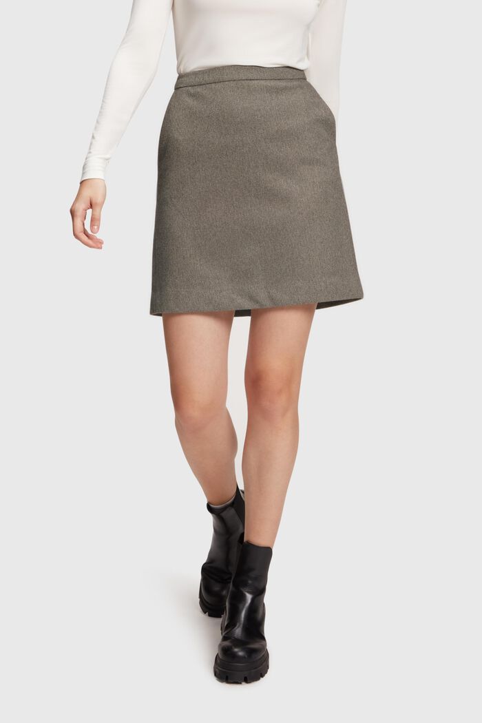 Kort nederdel med tofarvet, vævet mønster